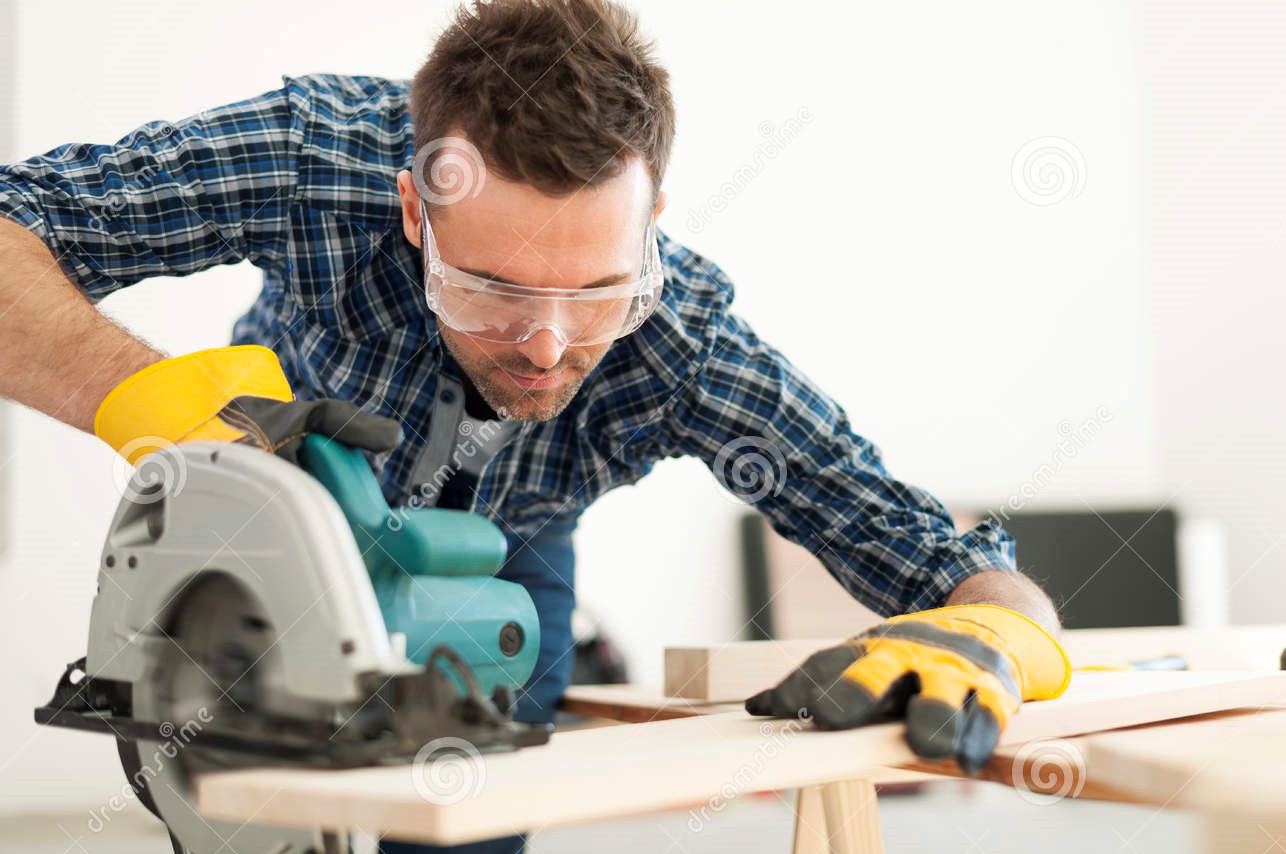 carpenter-work-hard-working-cutting-wooden-plank-39367713